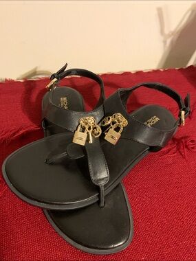 Michael Kors Black Leather Thong Sandals with Gold Padlock Charms